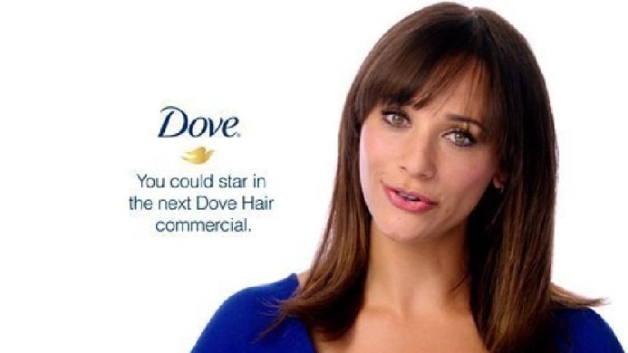 Rashida Jones on the Dove commercial with her brown bang hair on her blue t-shirt